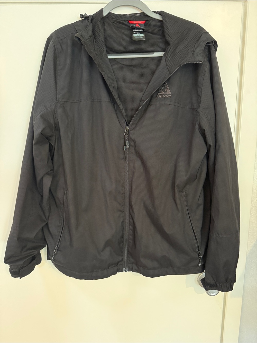 Gerry hooded lightweight mesh line rain jacket men's size large Black